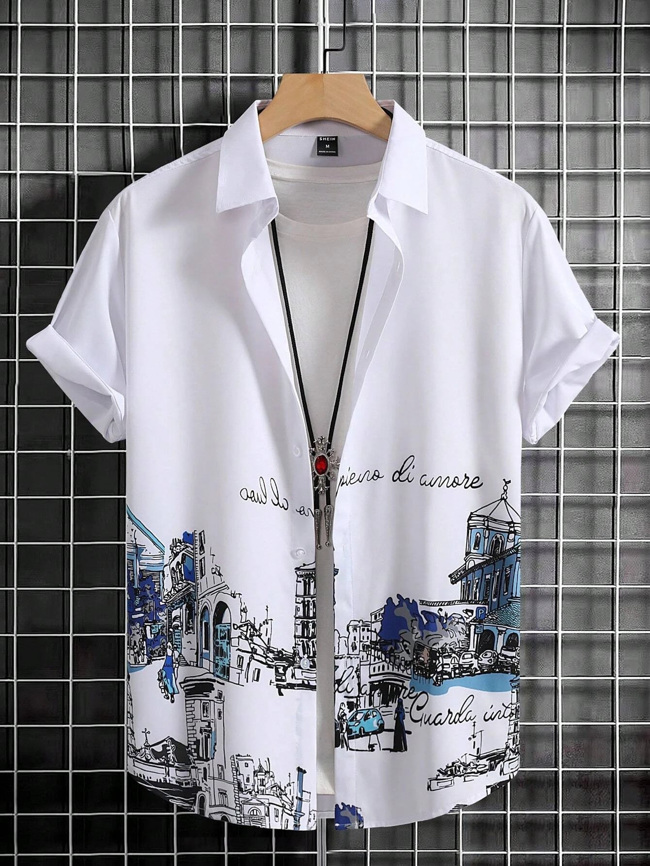 Nilo – Polo Estiva Con Stampa Tropicale E Maniche Corte Con Risvolto