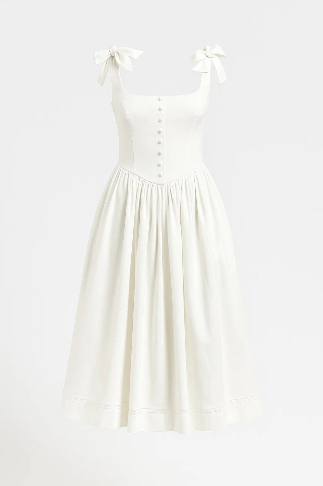 Karolina – Abito Midi in Cotone con Fiocchi e Bottoni Decorativi Bianco