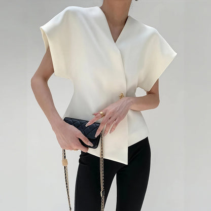 Nicoletta – Top Elegante Con Dettaglio Nodo E Maniche Strutturate