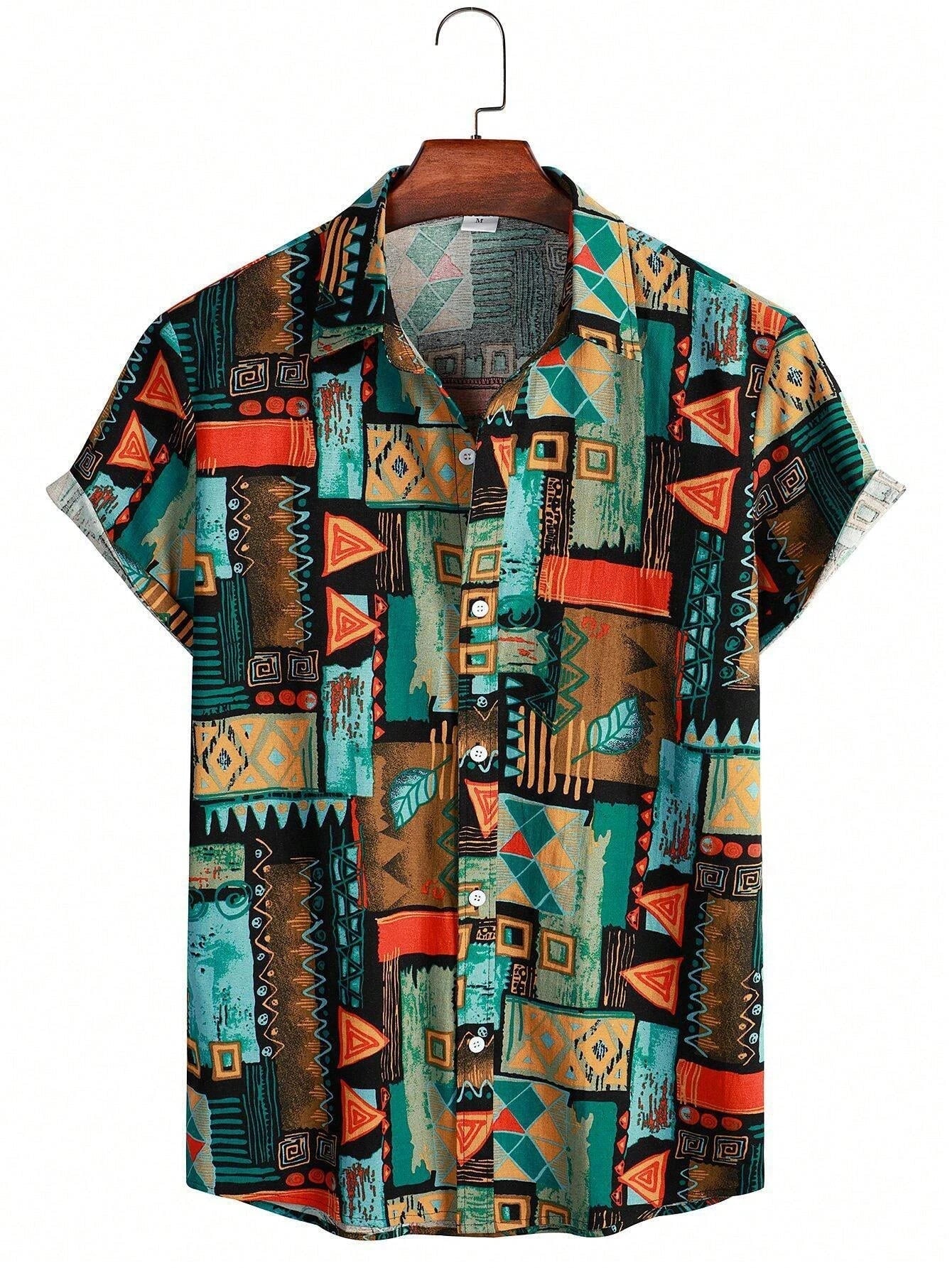 Nilo – Polo Estiva Con Stampa Tropicale E Maniche Corte Con Risvolto