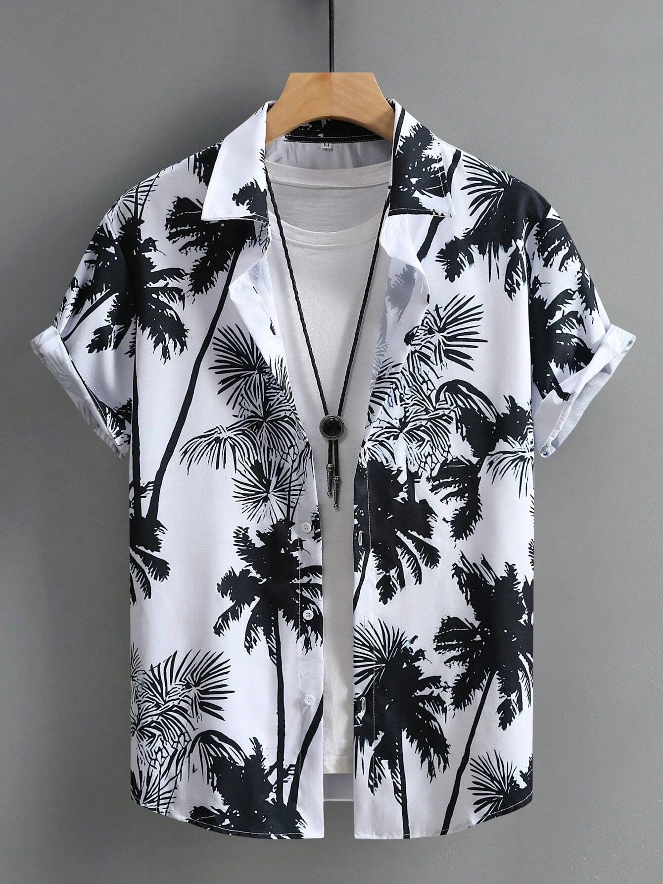 Nilo – Polo Estiva Con Stampa Tropicale E Maniche Corte Con Risvolto