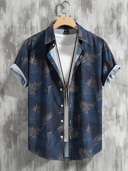 Nilo – Polo Estiva Con Stampa Tropicale E Maniche Corte Con Risvolto