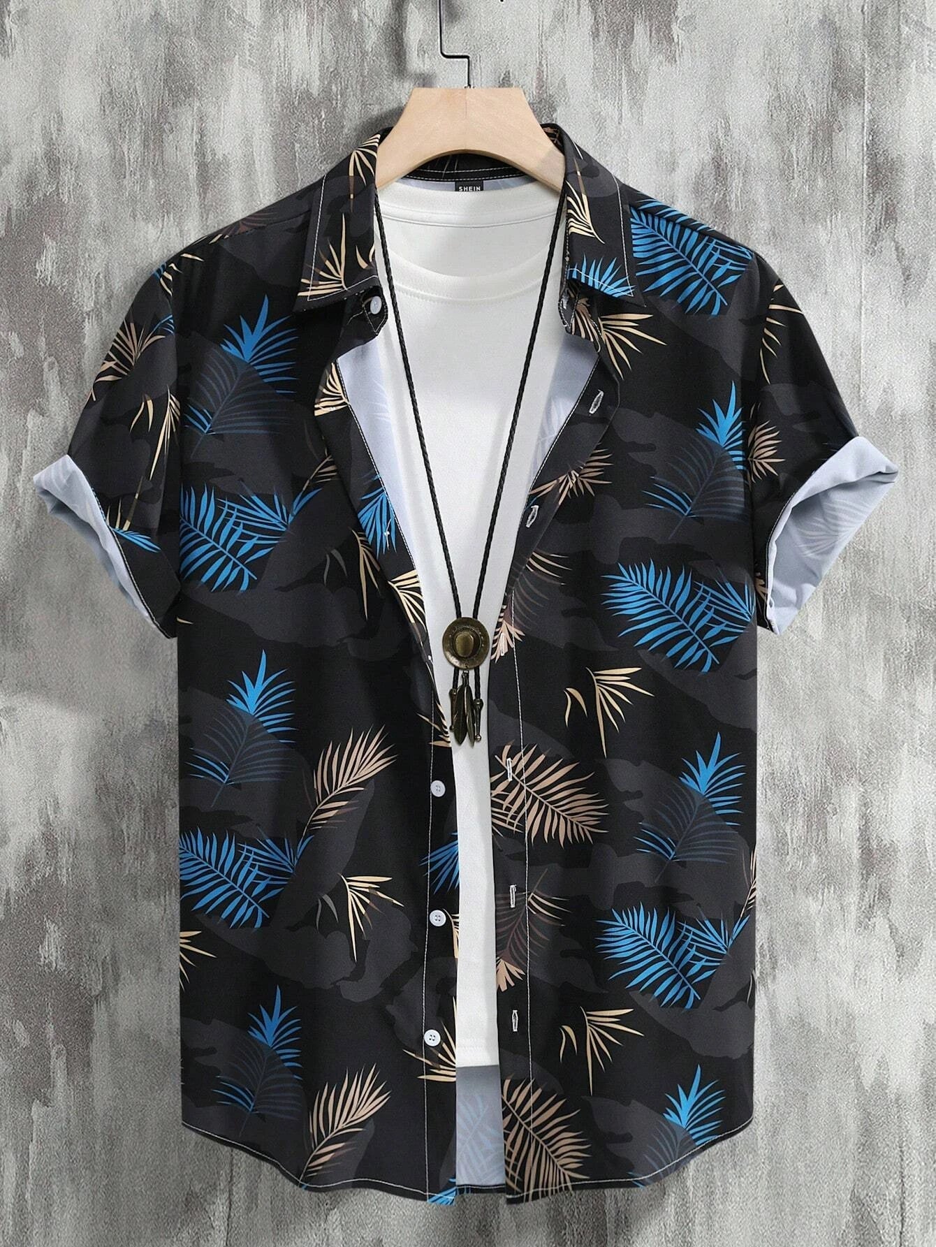 Nilo – Polo Estiva Con Stampa Tropicale E Maniche Corte Con Risvolto