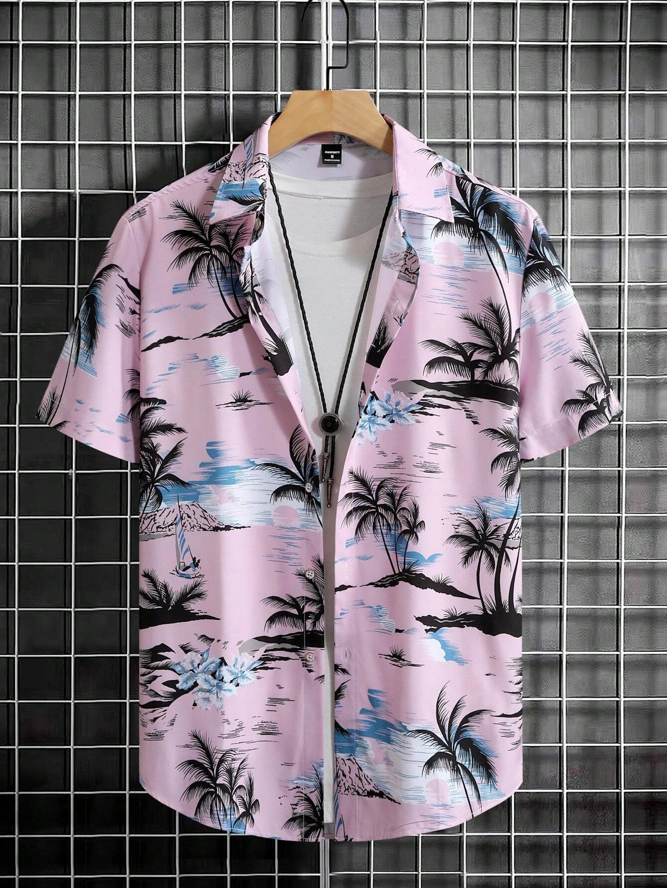 Nilo – Polo Estiva Con Stampa Tropicale E Maniche Corte Con Risvolto