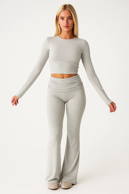 Ulpia – Completo Aderente Con Top A Maniche Lunghe E Pantaloni Svasati