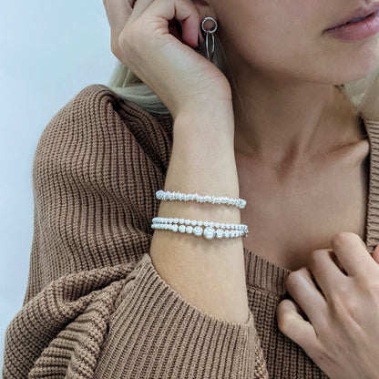 Fiorella – Orecchini Pendenti Cerchi Intrecciati Argento Sterling Doppio Hoop